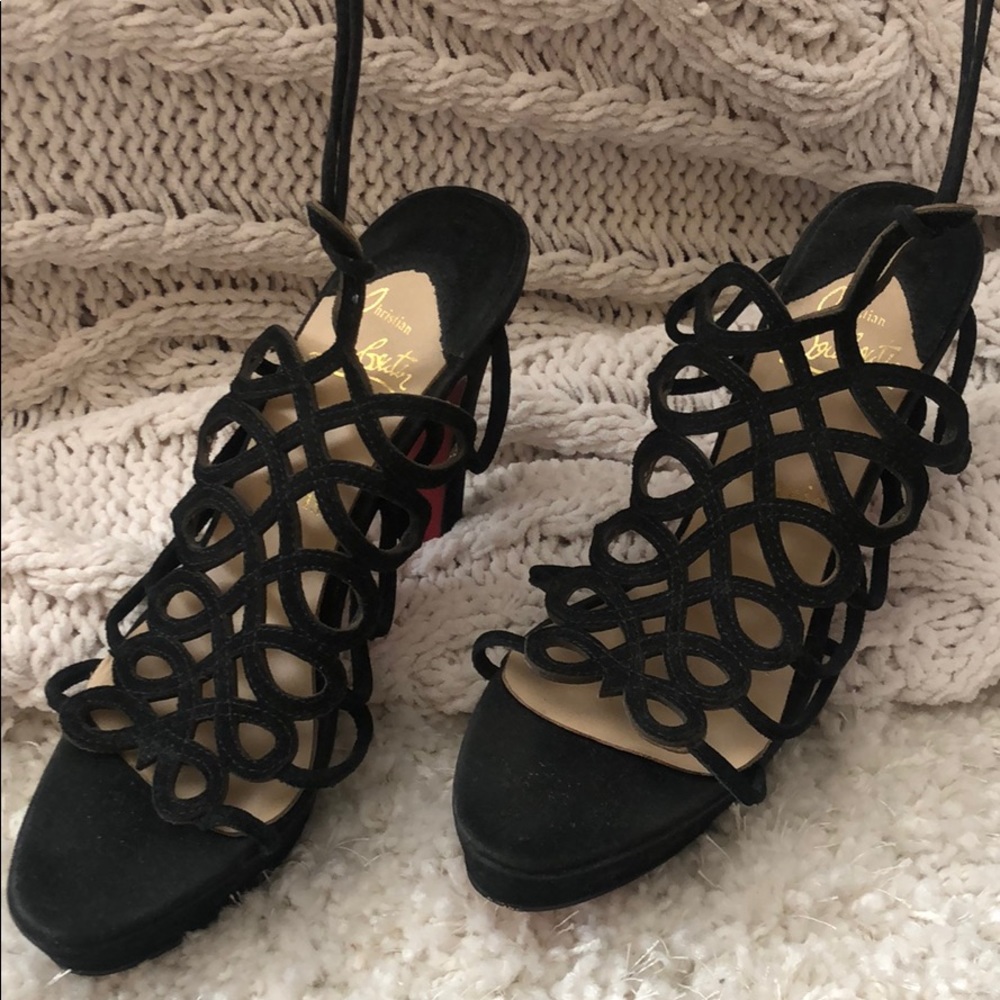 Replica? Christian Louboutin red bottoms lace up